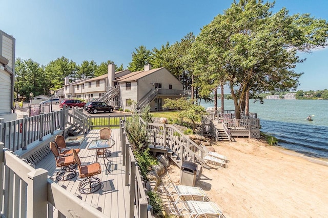 1093 Canyon Rd Unit 603, Wisconsin Dells, WI 53965 - deck with stairway and a water view
