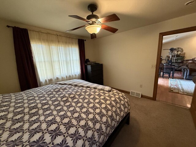 422 Callaway Blvd, La Crosse, WI 54603 - bedroom featuring carpet floors, baseboards, and ceiling fan