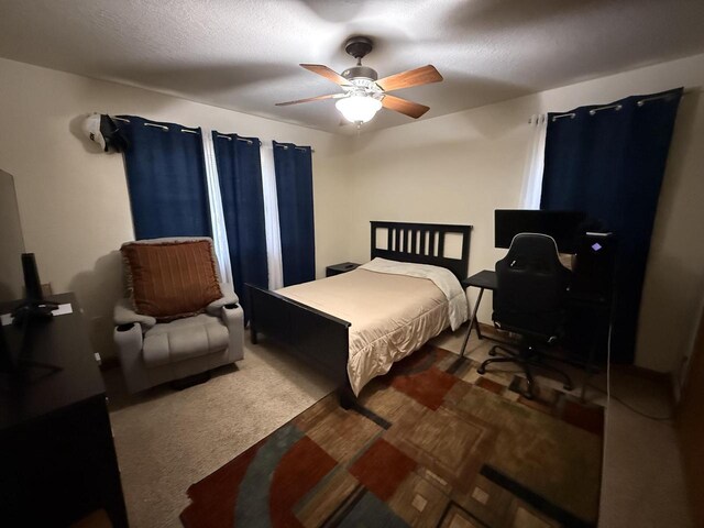 422 Callaway Blvd, La Crosse, WI 54603 - bedroom with carpet flooring, a ceiling fan, and an office area