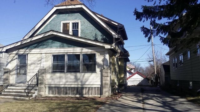 view of home's exterior with entry steps