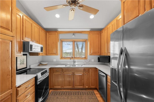 29825 Minerva Cir, Danbury, WI 54830 - kitchen featuring appliances with stainless steel finishes, a sink, light countertops, a ceiling fan, and recessed lighting