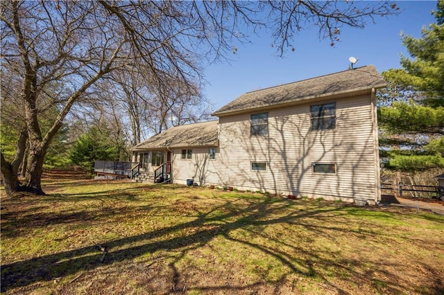 29825 Minerva Cir, Danbury, WI 54830 - back of property with a deck and a lawn