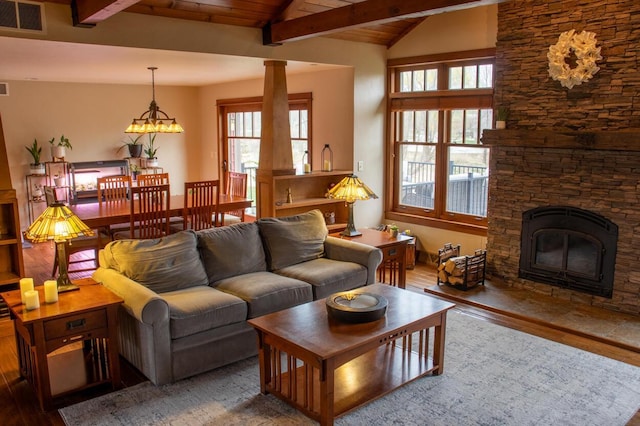 953 Larkspur Rd, Plymouth, WI 53073 - living area featuring wood finished floors, wood ceiling, and a stone fireplace