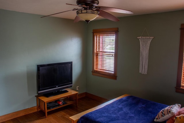 953 Larkspur Rd, Plymouth, WI 53073 - bedroom featuring baseboards, wood finished floors, and a ceiling fan