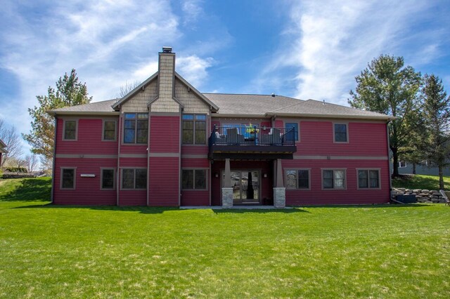 953 Larkspur Rd, Plymouth, WI 53073 - back of property featuring a lawn and a chimney