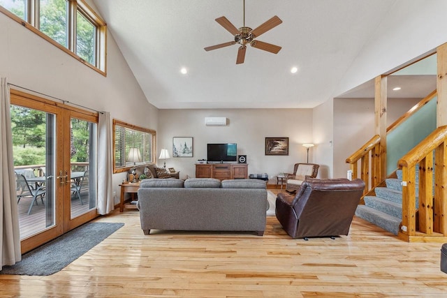 E9510 Oak Hill Rd, Wisconsin Dells, WI 53965 - living room with high vaulted ceiling, light wood-style floors, recessed lighting, french doors, and ceiling fan