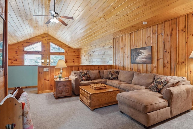 E9510 Oak Hill Rd, Wisconsin Dells, WI 53965 - living area featuring wood walls, light colored carpet, a ceiling fan, wooden ceiling, and vaulted ceiling