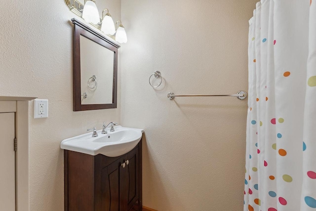 E9510 Oak Hill Rd, Wisconsin Dells, WI 53965 - bathroom with vanity and a shower with curtain