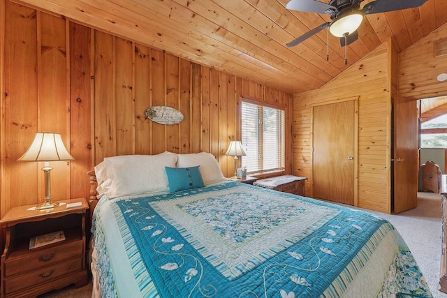 E9510 Oak Hill Rd, Wisconsin Dells, WI 53965 - bedroom with vaulted ceiling, carpet flooring, wood ceiling, wooden walls, and a closet