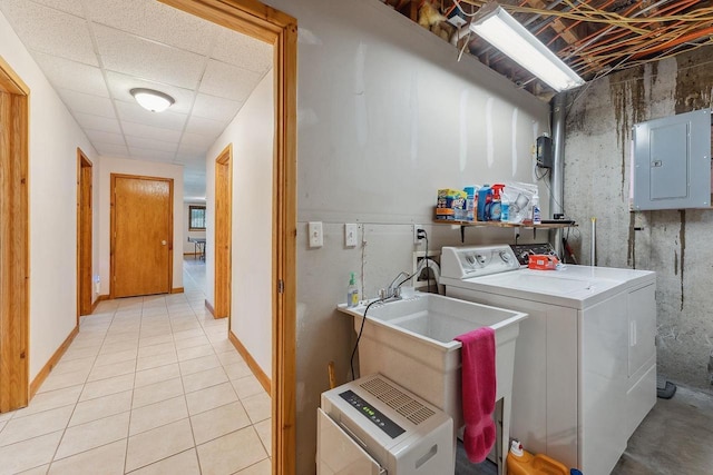 E9510 Oak Hill Rd, Wisconsin Dells, WI 53965 - washroom with electric panel, independent washer and dryer, and light tile patterned flooring