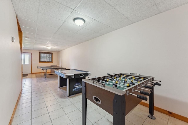 E9510 Oak Hill Rd, Wisconsin Dells, WI 53965 - recreation room featuring light tile patterned flooring, baseboards, and a drop ceiling