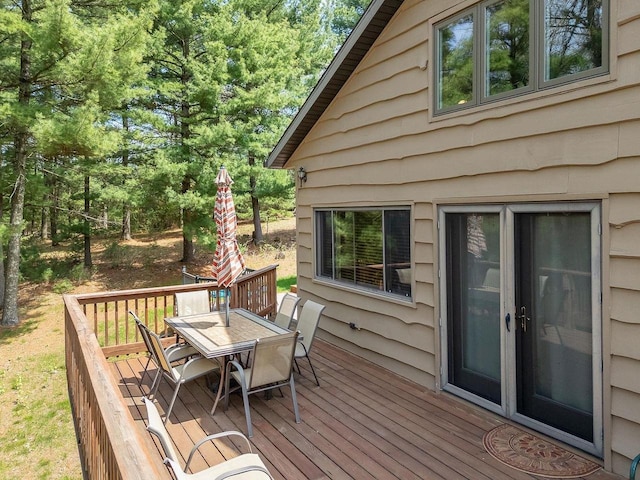 E9510 Oak Hill Rd, Wisconsin Dells, WI 53965 - wooden terrace with outdoor dining space