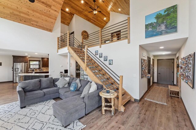 S952 W Redstone Dr, La Valle, WI 53941 - living area with high vaulted ceiling, stairs, wood finished floors, wooden ceiling, and recessed lighting