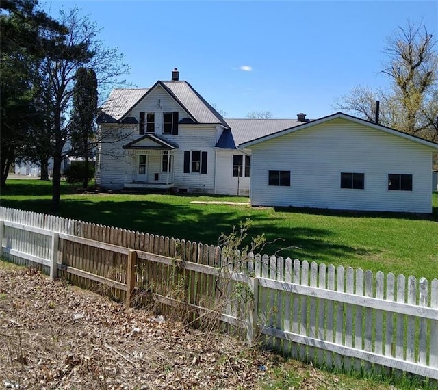N34855 County Rd S, Blair, WI 54616 - view of front facade featuring a chimney and metal roof