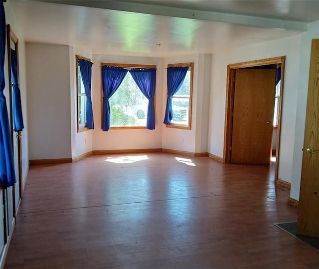 N34855 County Rd S, Blair, WI 54616 - unfurnished bedroom with wood finished floors and baseboards
