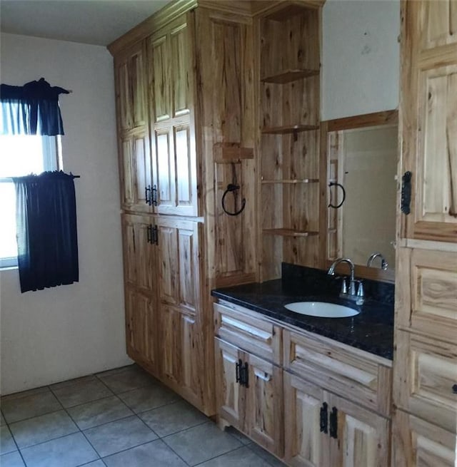 N34855 County Rd S, Blair, WI 54616 - bathroom featuring tile patterned floors and vanity