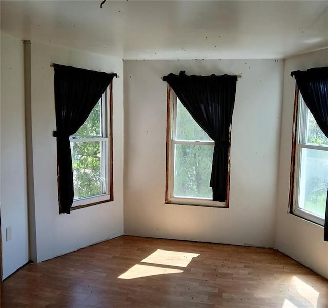 N34855 County Rd S, Blair, WI 54616 - spare room with wood finished floors