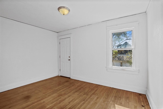 2535 N 48th St, Milwaukee, WI 53210 - unfurnished room with light wood finished floors and baseboards