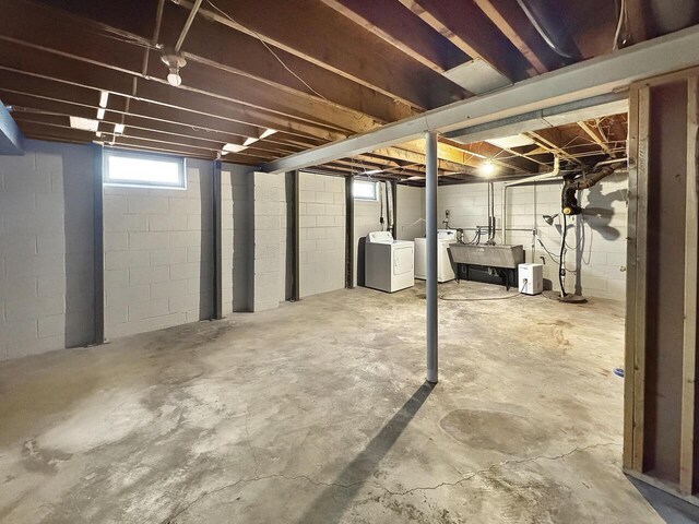 4538 Oakdale Dr, Racine, WI 53405 - basement with washer and dryer and a sink