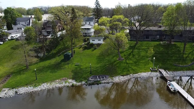 1263 N Parker Dr, Janesville, WI 53545 - aerial overview of property's location with a nearby body of water and nearby suburban area