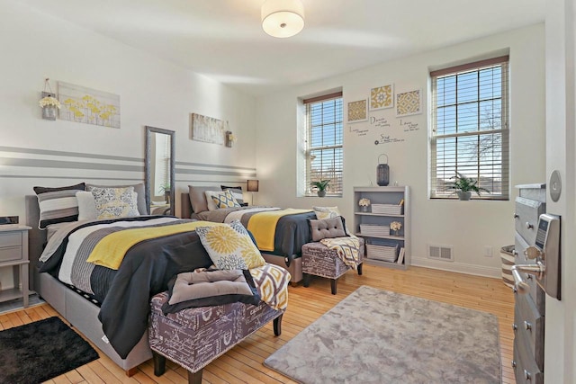 9302 39th Ave, Pleasant Prairie, WI 53158 - bedroom with hardwood / wood-style flooring and baseboards