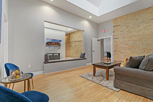 9302 39th Ave, Pleasant Prairie, WI 53158 - living room with wood-type flooring, a towering ceiling, baseboards, and recessed lighting