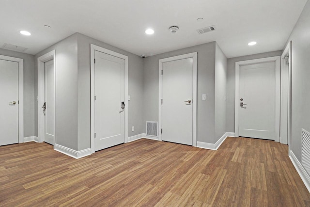 9302 39th Ave, Pleasant Prairie, WI 53158 - unfurnished bedroom featuring wood finished floors, baseboards, and recessed lighting