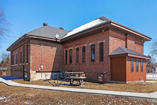 9302 39th Ave, Pleasant Prairie, WI 53158 - back of property with brick siding and a shingled roof