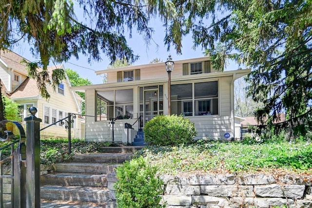 3112 Monroe St, Madison, WI 53711 - view of front of house featuring a sunroom and stairway