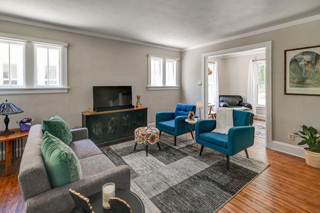 3112 Monroe St, Madison, WI 53711 - living area featuring wood finished floors, baseboards, and ornamental molding