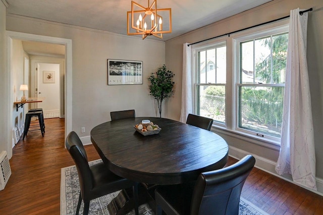 3112 Monroe St, Madison, WI 53711 - dining room with plenty of natural light, dark wood finished floors, a chandelier, and crown molding