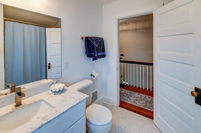 3112 Monroe St, Madison, WI 53711 - bathroom featuring toilet, vanity, and curtained shower