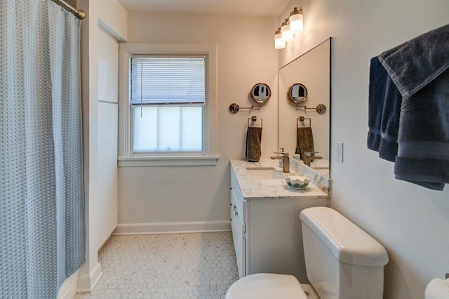 3112 Monroe St, Madison, WI 53711 - full bath with toilet, baseboards, vanity, and a shower with shower curtain