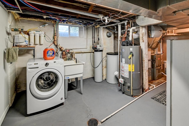 3112 Monroe St, Madison, WI 53711 - below grade area with washer / dryer, gas water heater, a water softener system, and a sink