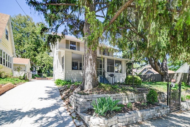 3112 Monroe St, Madison, WI 53711 - view of front of house with a gate, fence, and concrete driveway