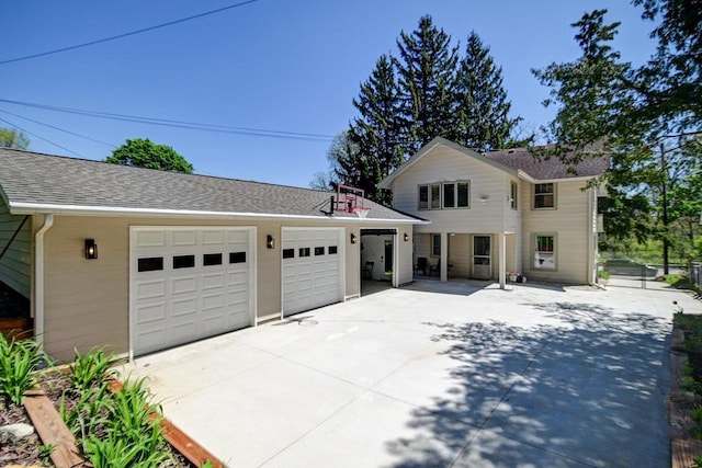 3112 Monroe St, Madison, WI 53711 - view of front of home with a garage, a shingled roof, and concrete driveway