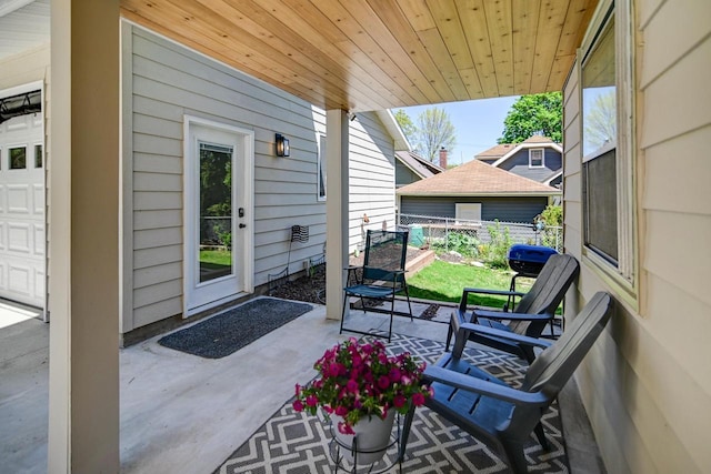 3112 Monroe St, Madison, WI 53711 - view of patio / terrace featuring fence and a garage