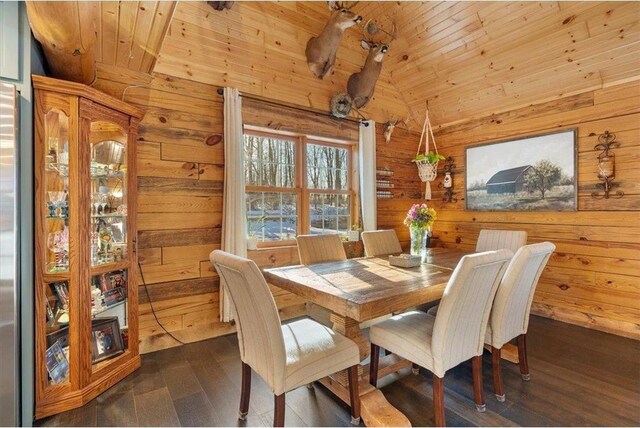 744 50th Ave, Clear Lake, WI 54005 - dining space featuring wood walls, dark wood-style floors, wood ceiling, and high vaulted ceiling