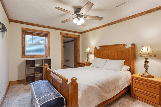 744 50th Ave, Clear Lake, WI 54005 - bedroom with light colored carpet, baseboards, ornamental molding, and ceiling fan