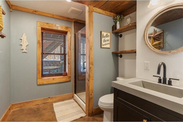 744 50th Ave, Clear Lake, WI 54005 - bathroom with toilet, a stall shower, baseboards, and vanity