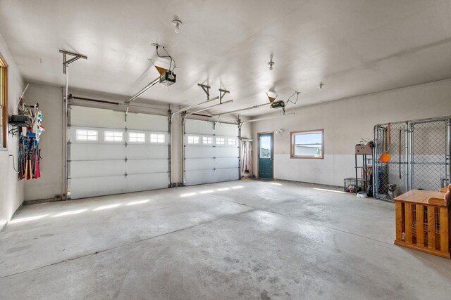 W3161 Julianna Ct, Chilton, WI 53014 - garage featuring a garage door opener