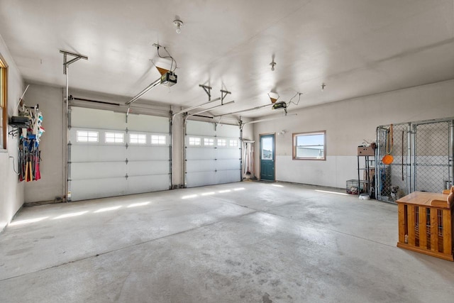 W3161 Julianna Ct, Chilton, WI 53014 - garage featuring a garage door opener