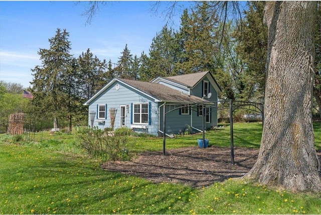 6300 Painter Rd, Mound, MN 55364 - view of front of house featuring a front lawn