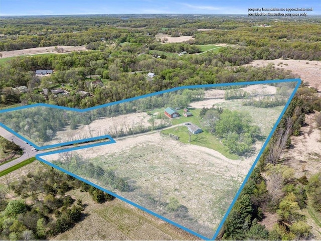 6300 Painter Rd, Mound, MN 55364 - aerial view of property's location with property boundaries highlighted and a heavily wooded area