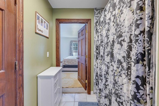 3877 Apple Ln, Oshkosh, WI 54902 - bathroom with connected bathroom, marble look tiles, and a shower with shower curtain