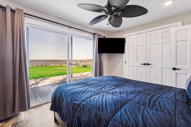 N8432 Minawa Beach Rd, Fond Du Lac, WI 54937 - bedroom featuring access to outside, light wood-style flooring, recessed lighting, and a ceiling fan