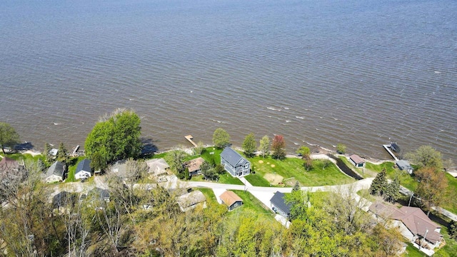 N8432 Minawa Beach Rd, Fond Du Lac, WI 54937 - aerial view of property and surrounding area with nearby suburban area and a large body of water
