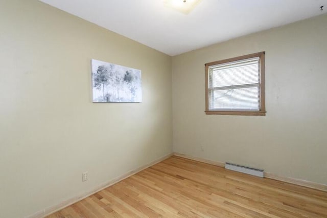 2334 W Custer Ave, Glendale, WI 53209 - spare room with light wood-style floors and baseboards