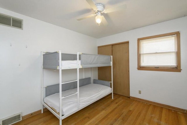 2334 W Custer Ave, Glendale, WI 53209 - bedroom featuring baseboards, wood finished floors, and ceiling fan
