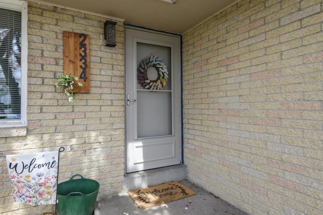 2334 W Custer Ave, Glendale, WI 53209 - doorway to property featuring brick siding